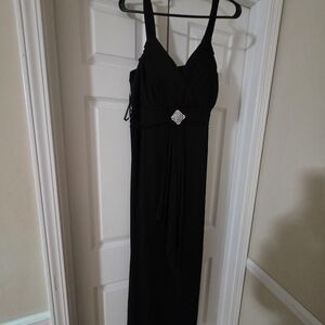B. Smart Black Maxi Dress with Embellished Detail